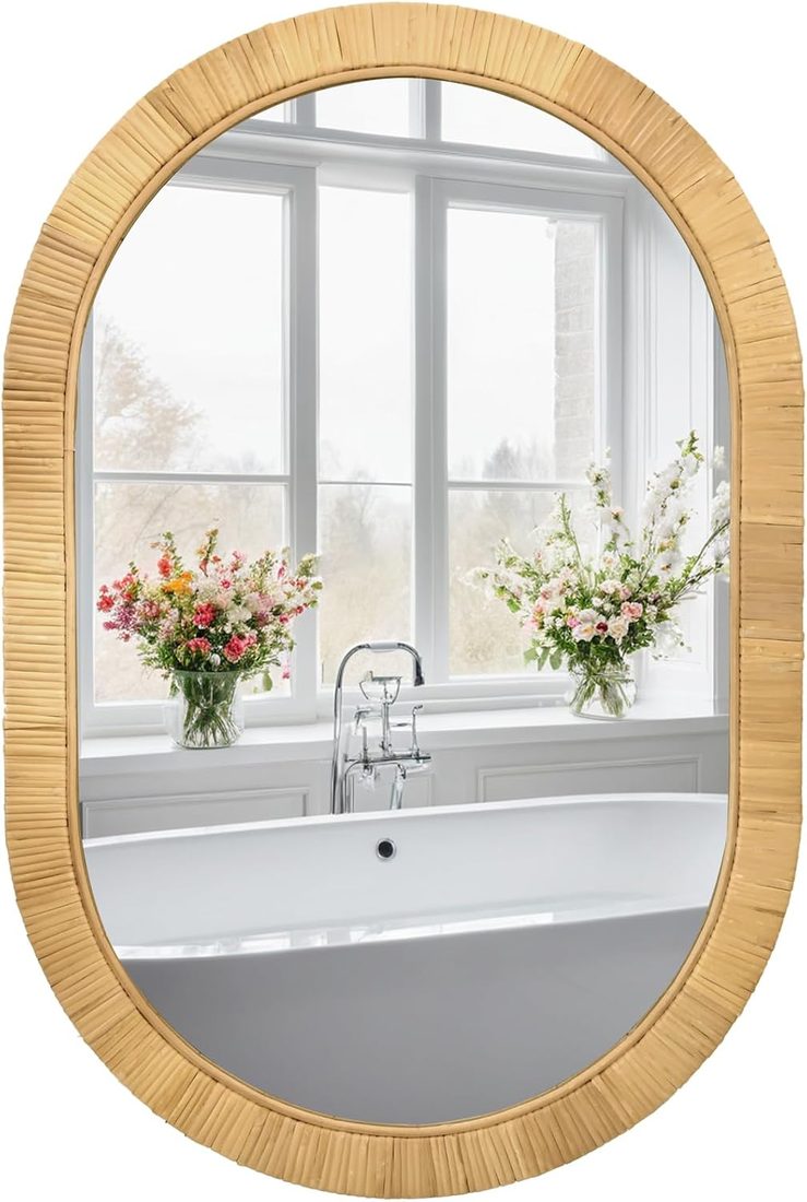 Oval rattan wall mirror with a wrapped reed frame